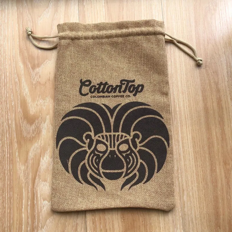 custom printed jute drawstring pouch with black logo for wholesale gift packaging