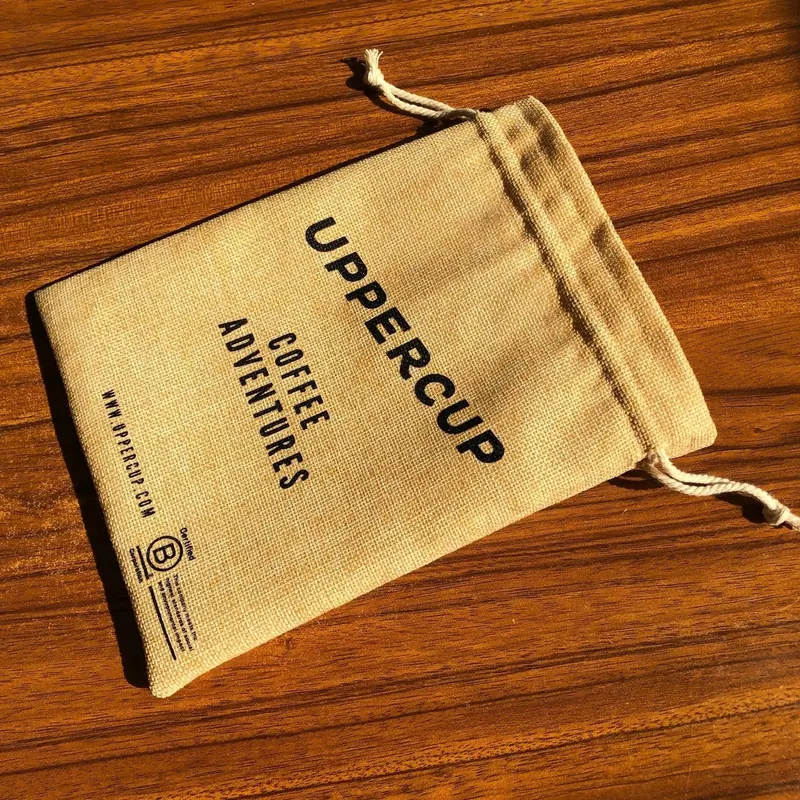 custom jute gift and coffee drawstring bag with printed branding